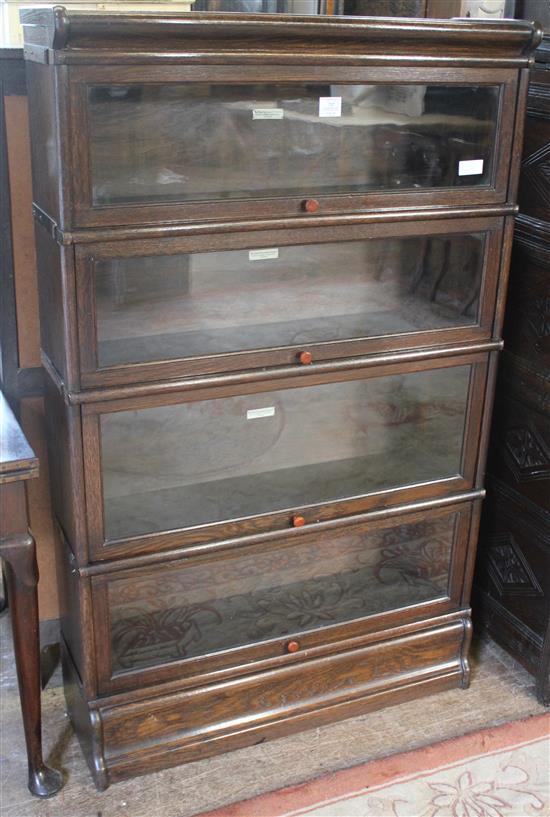 Globe Wernicke four section glazed oak bookcase